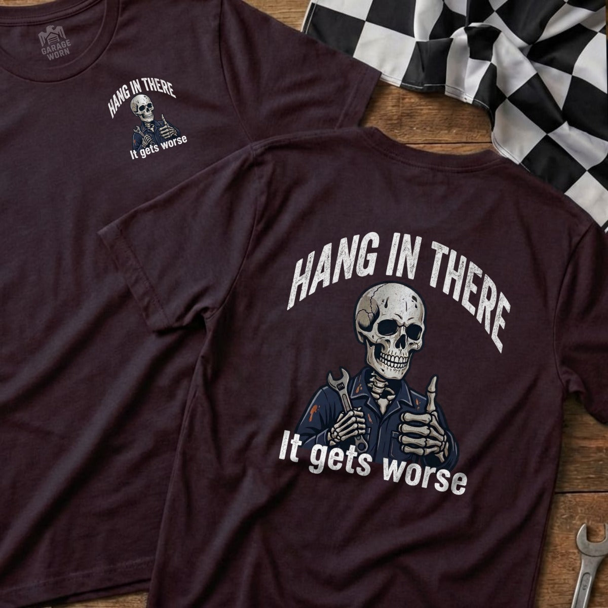 Maroon t-shirt with skeleton giving thumbs up, text "Hang in There, It gets worse".
