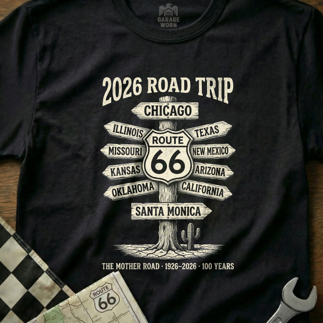 Black t-shirt with "2026 Road Trip Route 66" and directional signs.