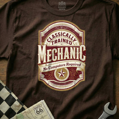 Brown t-shirt with a vintage-style "Classically Trained Mechanic" emblem and "No Computers Required."