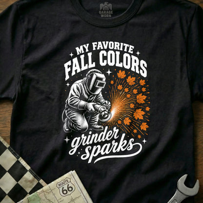 Black t-shirt graphic with "My Favorite Fall Colors Grinder Sparks" and a welder with sparks.