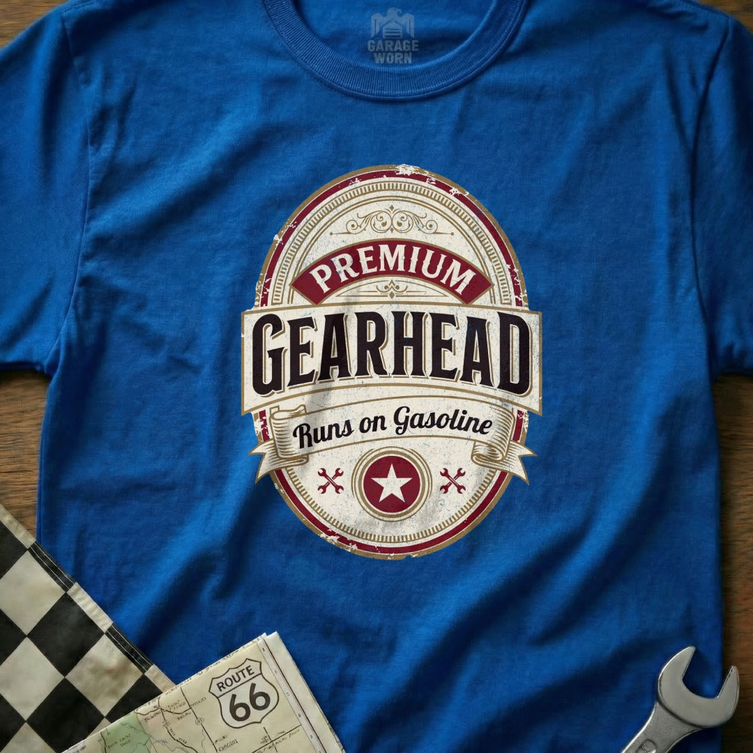 Blue t-shirt with "Premium Gearhead Runs on Gasoline" oval logo.