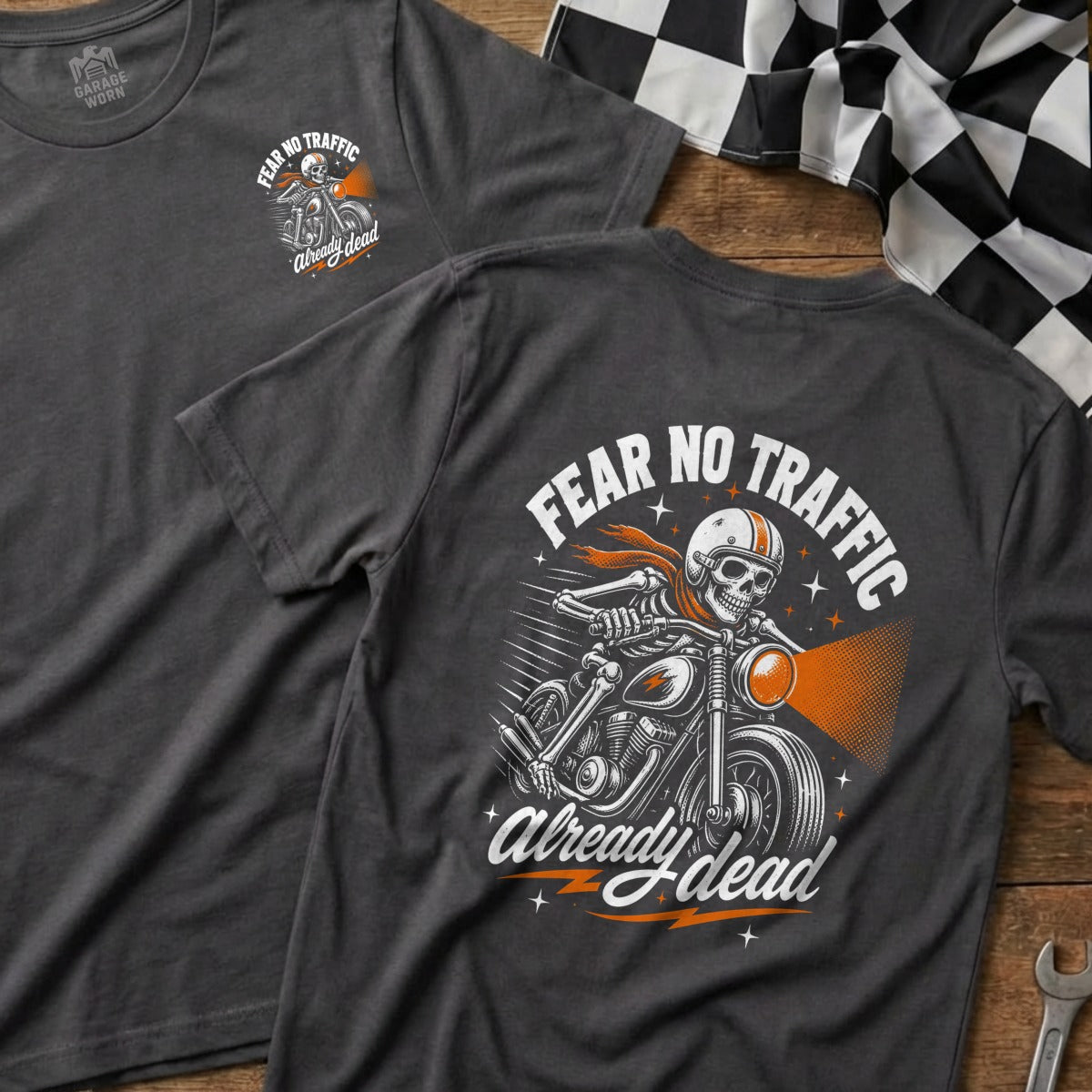Dark grey t-shirt with a skeleton biker graphic and text "Fear No Traffic Already Dead."