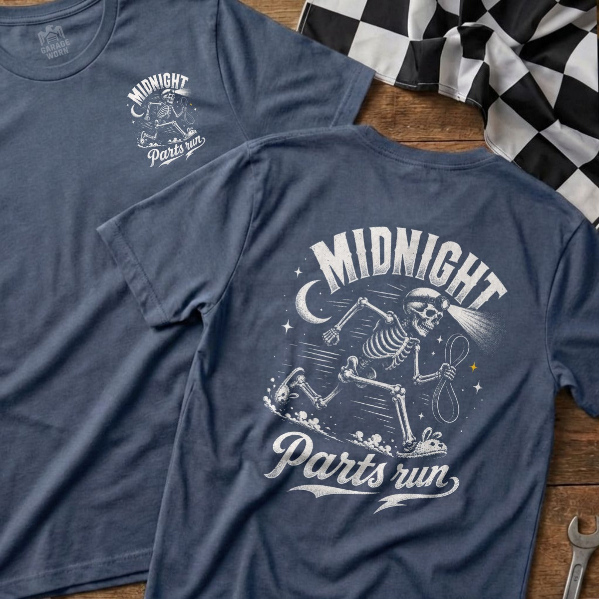 T-shirt with graphic of running skeleton, moon, stars, and text "MIDNIGHT Parts run".