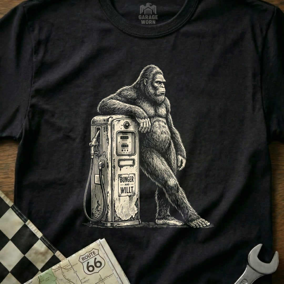 Gorilla leaning on a vintage BINGER and WILLIT gas pump, checker flag.