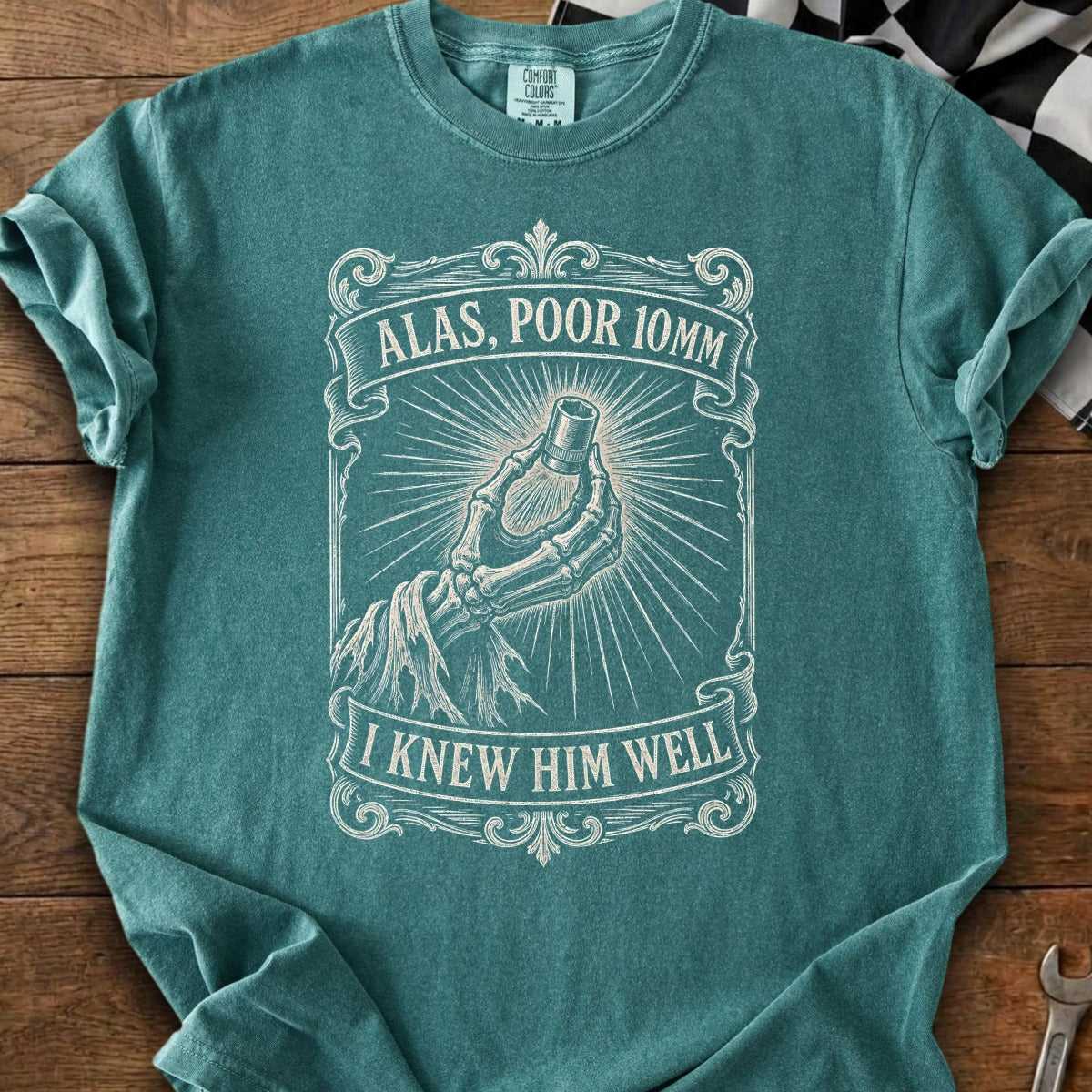 Shirt with skeleton hand holding socket, text: Alas, Poor 10mm I Knew Him Well.