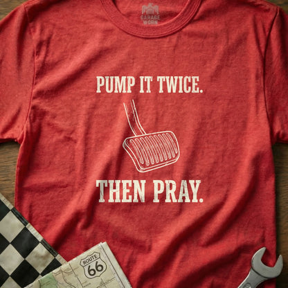 Red t-shirt with white text "Pump it twice. Then pray." and an image of a clutch pedal.