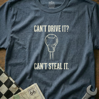 T-shirt with "Can't Drive It? Can't Steal It." and a gear shift knob.
