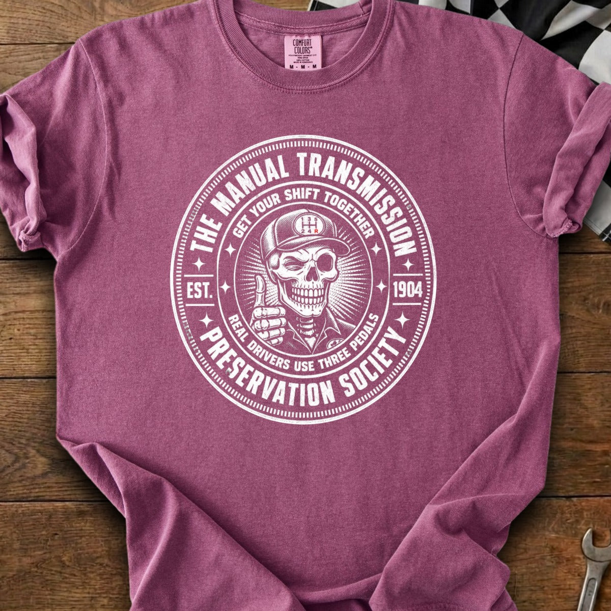 Shirt with "The Manual Transmission Preservation Society" graphic and skeleton driver.
