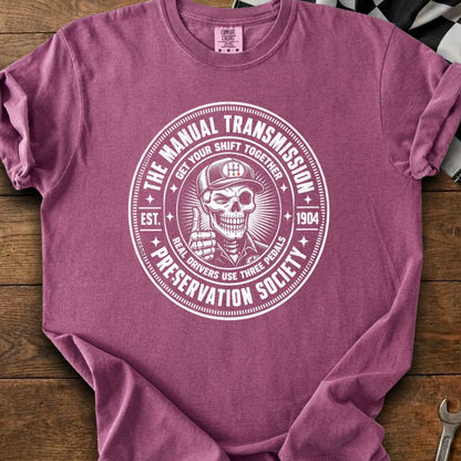 Shirt with "The Manual Transmission Preservation Society" graphic and skeleton driver.