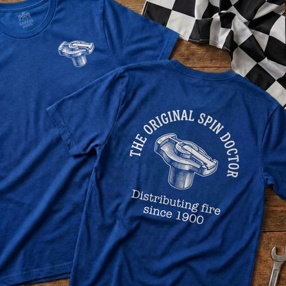 Blue t-shirt with a white graphic of a distributor cap and spark plug wire.