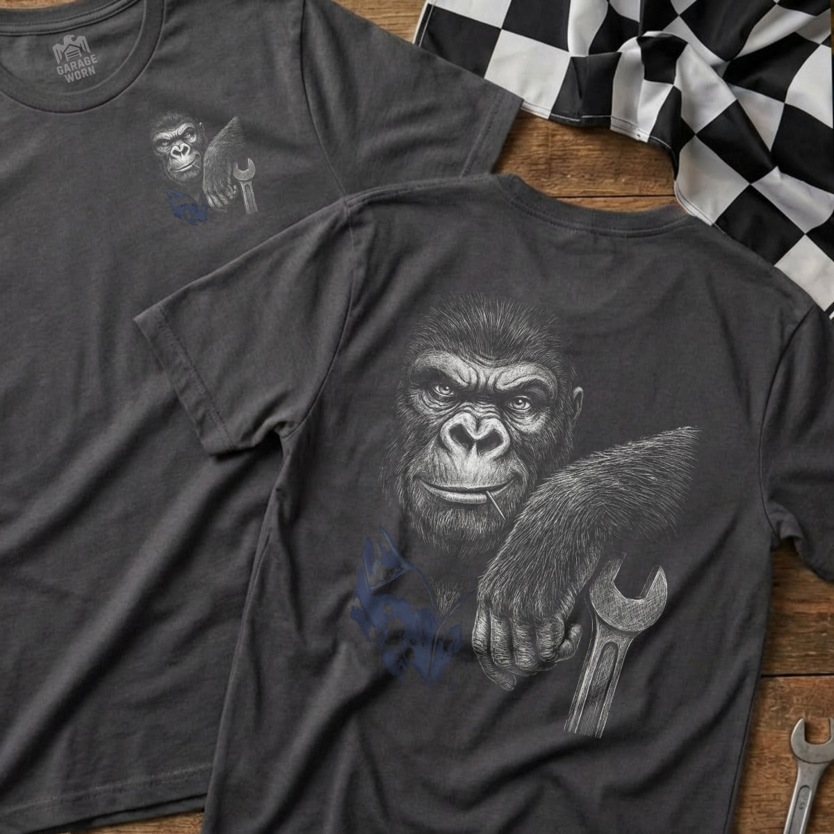 T-shirt with a detailed drawing of a gorilla holding a wrench.