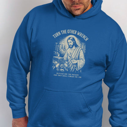 Jesus holding a wrench with "Turn the Other Wrench" text.