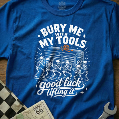 T-shirt with "Bury Me With My Tools, Good Luck Lifting It" and skeletons carrying a toolbox.