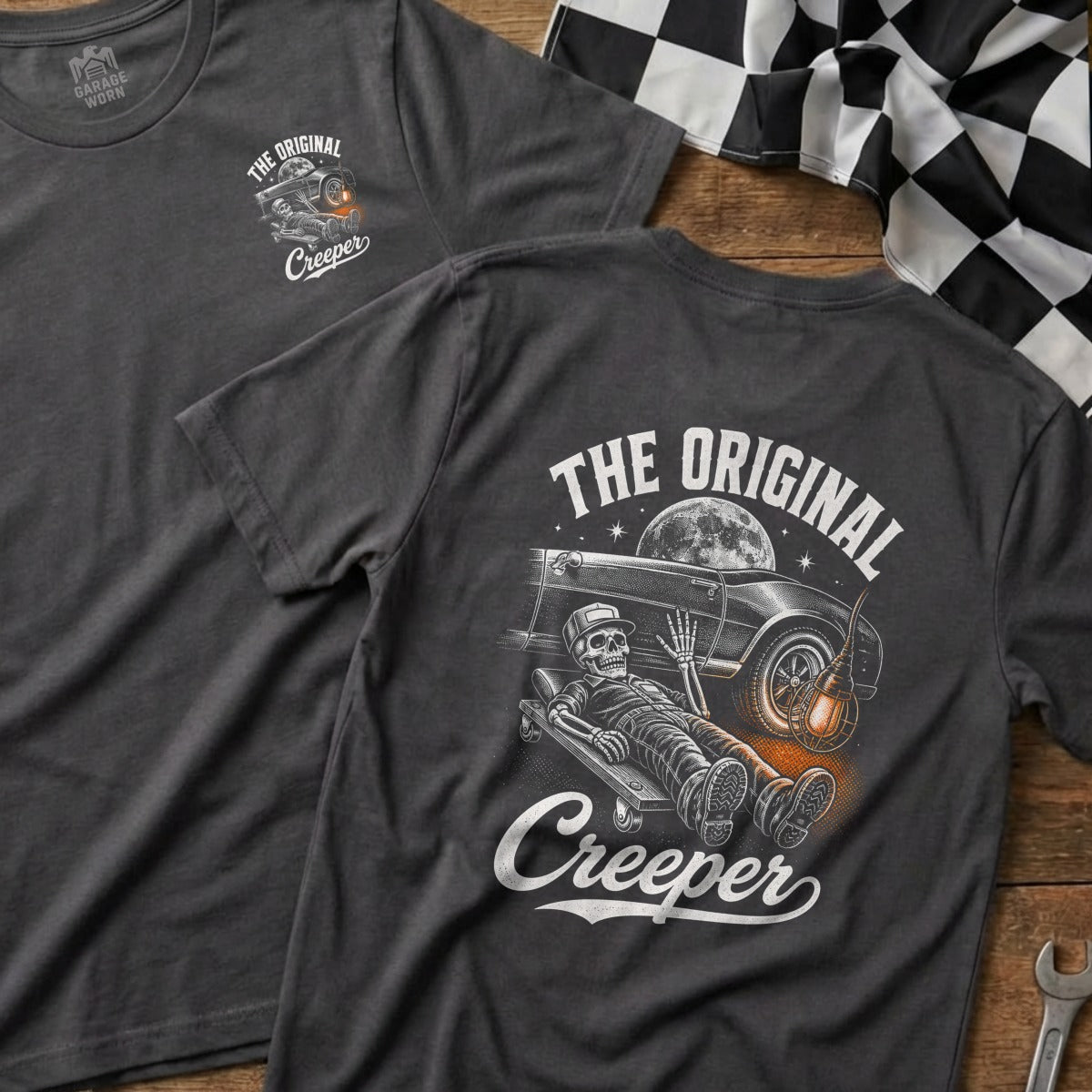 Dark gray t-shirt with "The Original Creeper" text and skeleton mechanic graphic.