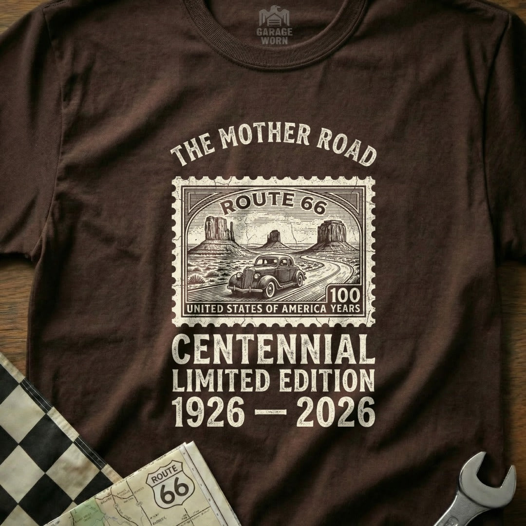 Brown t-shirt with Route 66 centennial design featuring a vintage car and text.