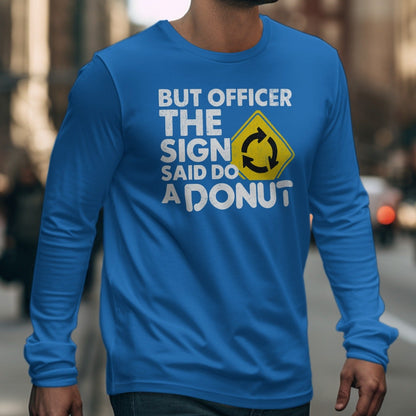 Blue long sleeve t-shirt with white text and a yellow roundabout sign.