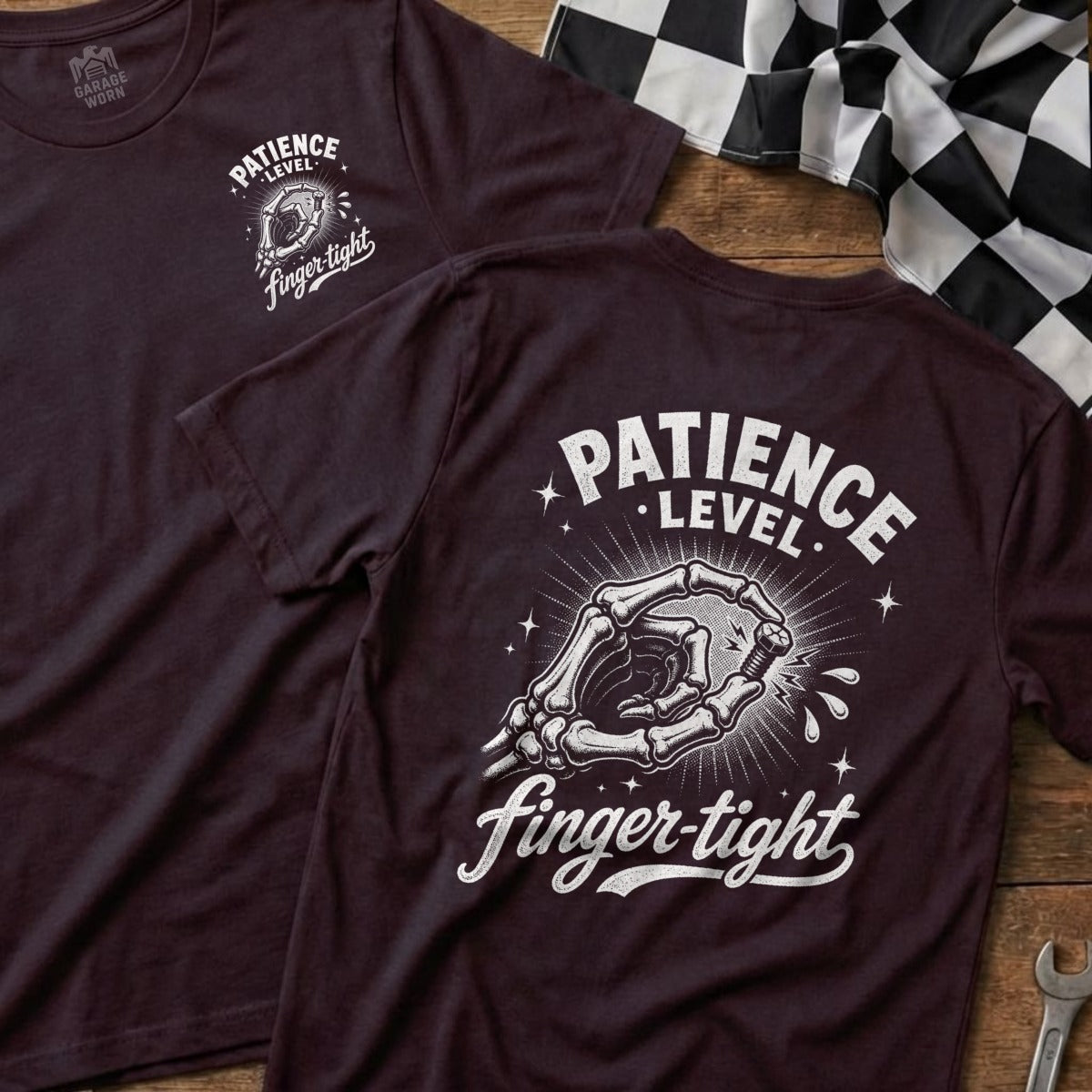 Dark t-shirt with a skeleton hand holding a bolt, text reads "Patience Level Finger-Tight".
