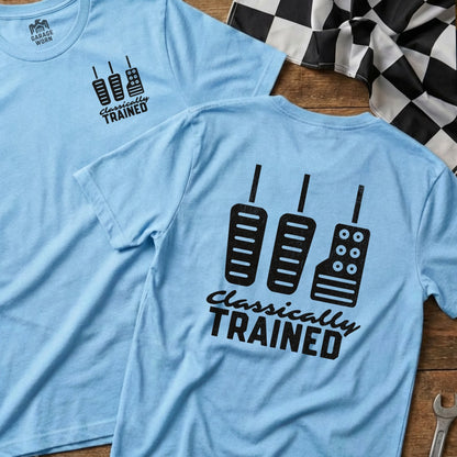 Light blue t-shirt with pedal graphics and "Classically Trained" text.