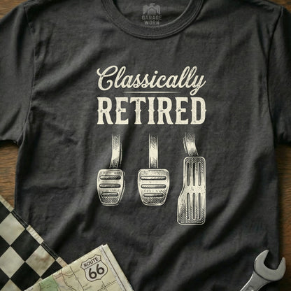 Dark t-shirt with "Classically RETIRED" text and car pedals.