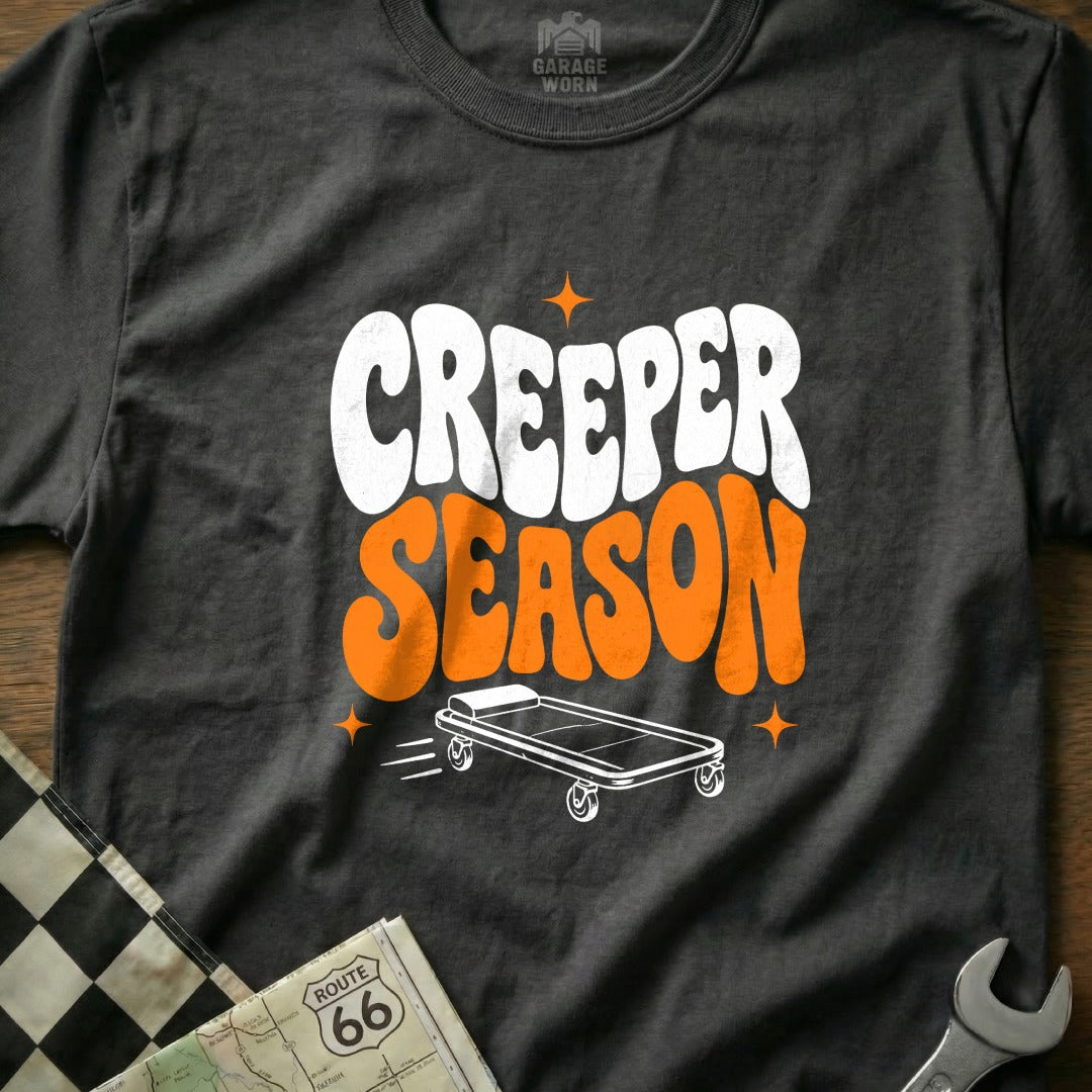 Charcoal t-shirt with "CREEPER SEASON" graphic and a mechanic's creeper.