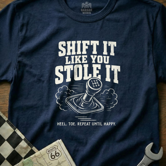 Navy t-shirt with "Shift It Like You Stole It" and a gear shift graphic.