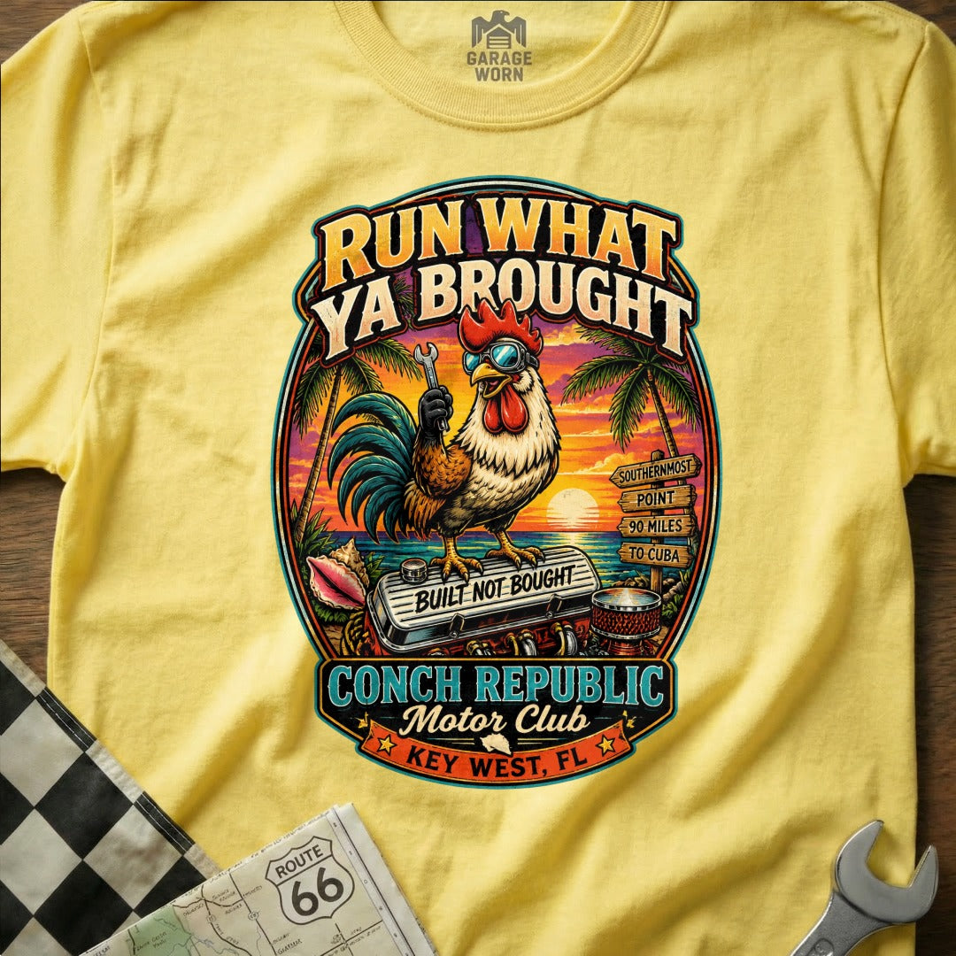 Yellow t-shirt with rooster graphic: "Run What Ya Brought", "Conch Republic Motor Club", "Key West, FL".