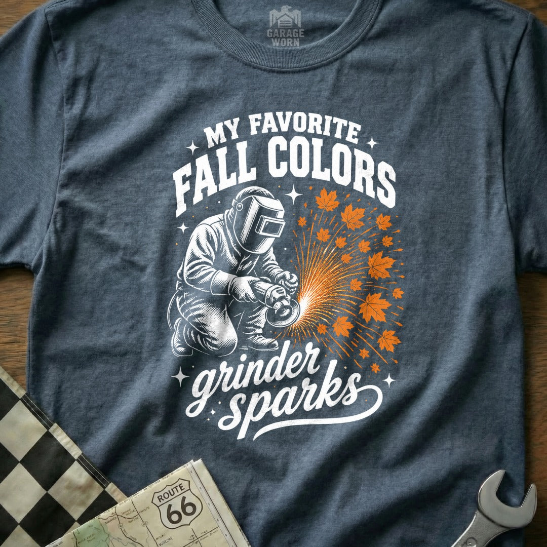T-shirt graphic of welder with "My Favorite Fall Colors Grinder Sparks" text and autumn leaves.