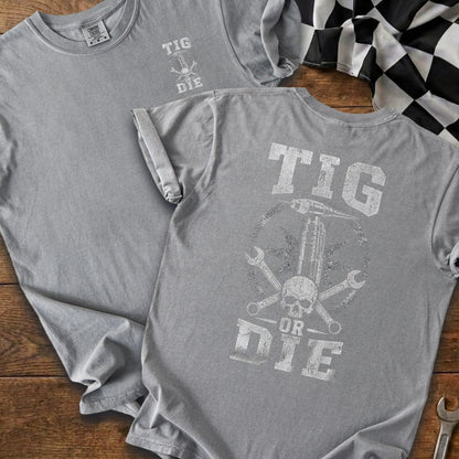 Gray t-shirt with "TIG OR DIE" text and graphic of welding torch, skull, and wrenches.