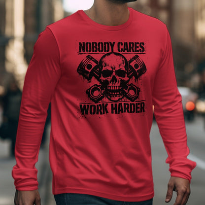 Red long sleeve shirt with black graphic of skull and pistons.