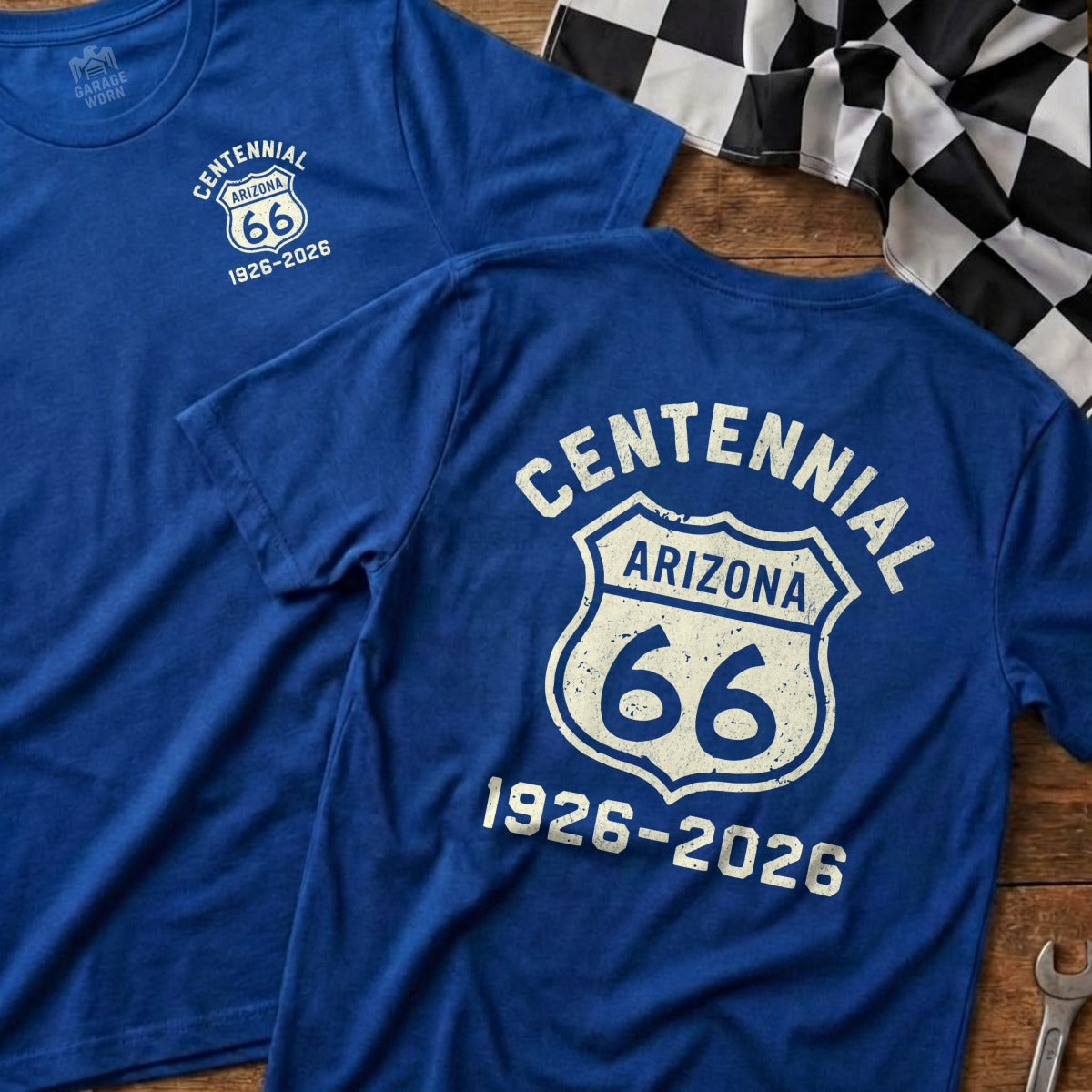 Blue t-shirts with Route 66 centennial logo and dates 1926-2026.