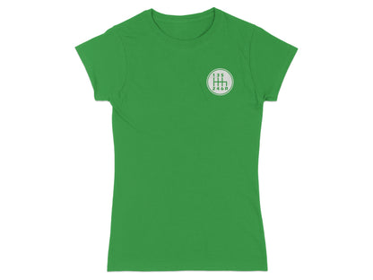 Green t-shirt with a circular manual transmission shift pattern graphic.
