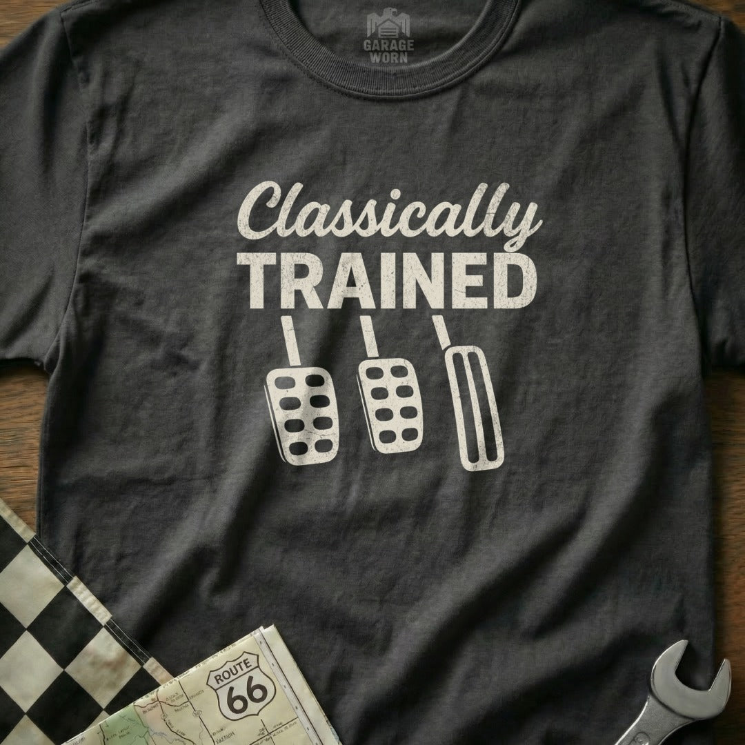 Dark t-shirt with "Classically Trained" and three pedals graphic.