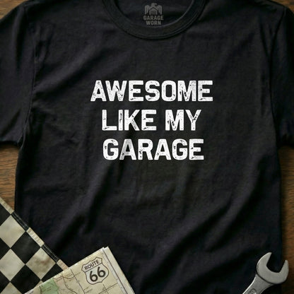 Black t-shirt with "AWESOME LIKE MY GARAGE" text and a checkered flag.