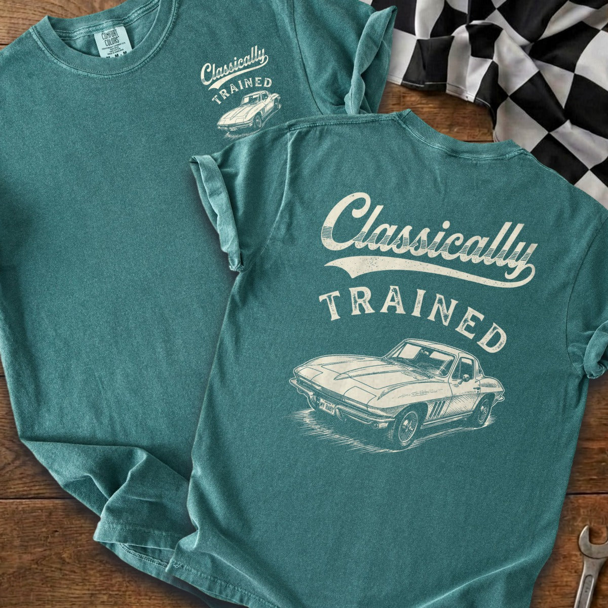 Teal t-shirt with "Classically TRAINED" text and vintage Corvette graphic.