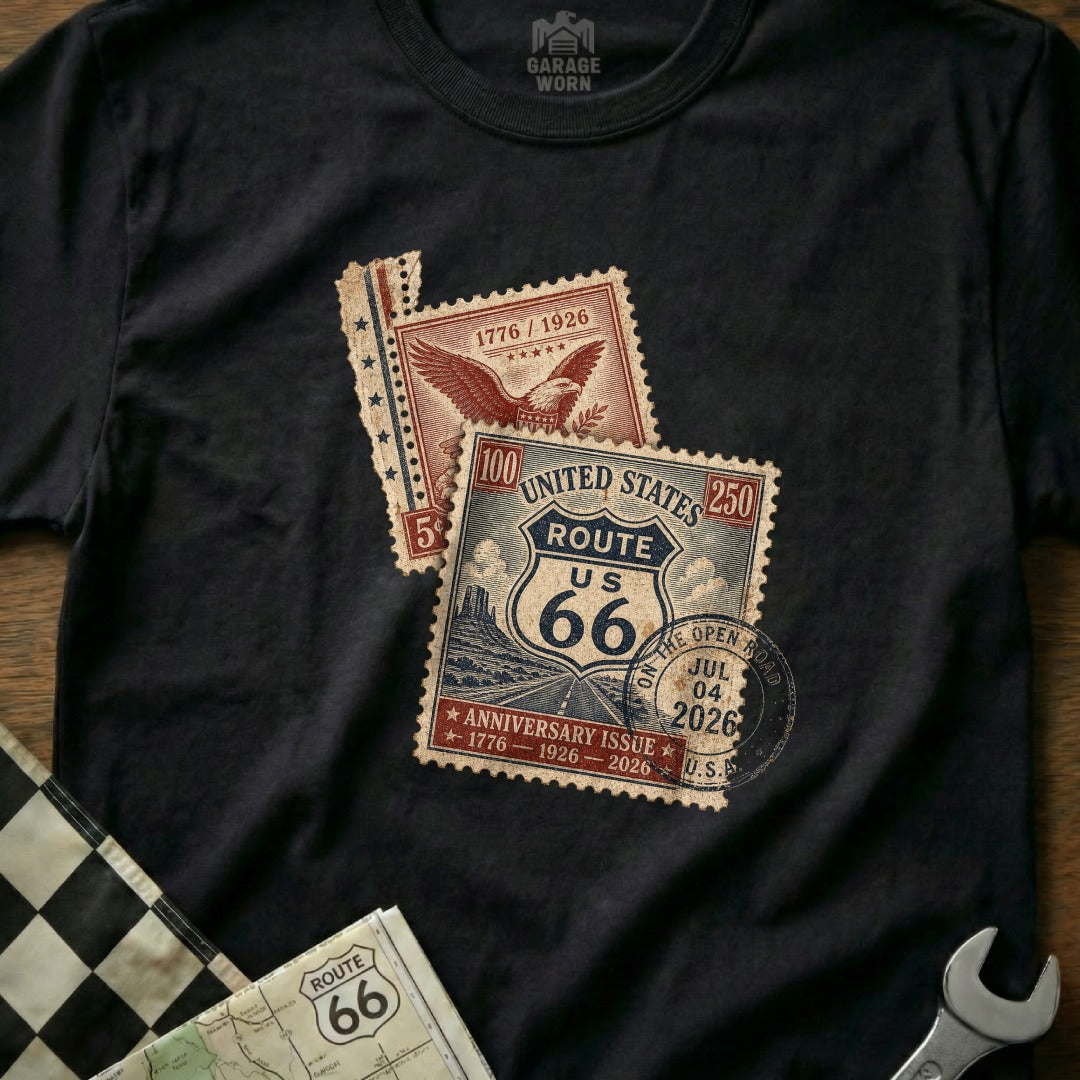Black t-shirt with Route 66 anniversary postage stamp graphics.