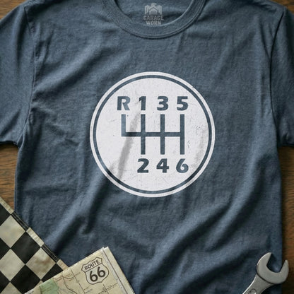 T-shirt with a white circle graphic of a six-speed manual transmission shift pattern.