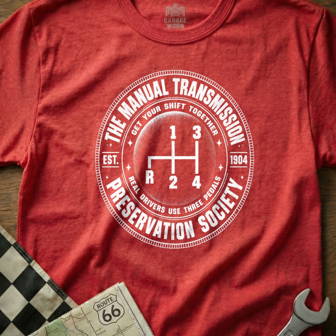Red t-shirt with "The Manual Transmission Preservation Society" and a gear shift diagram.