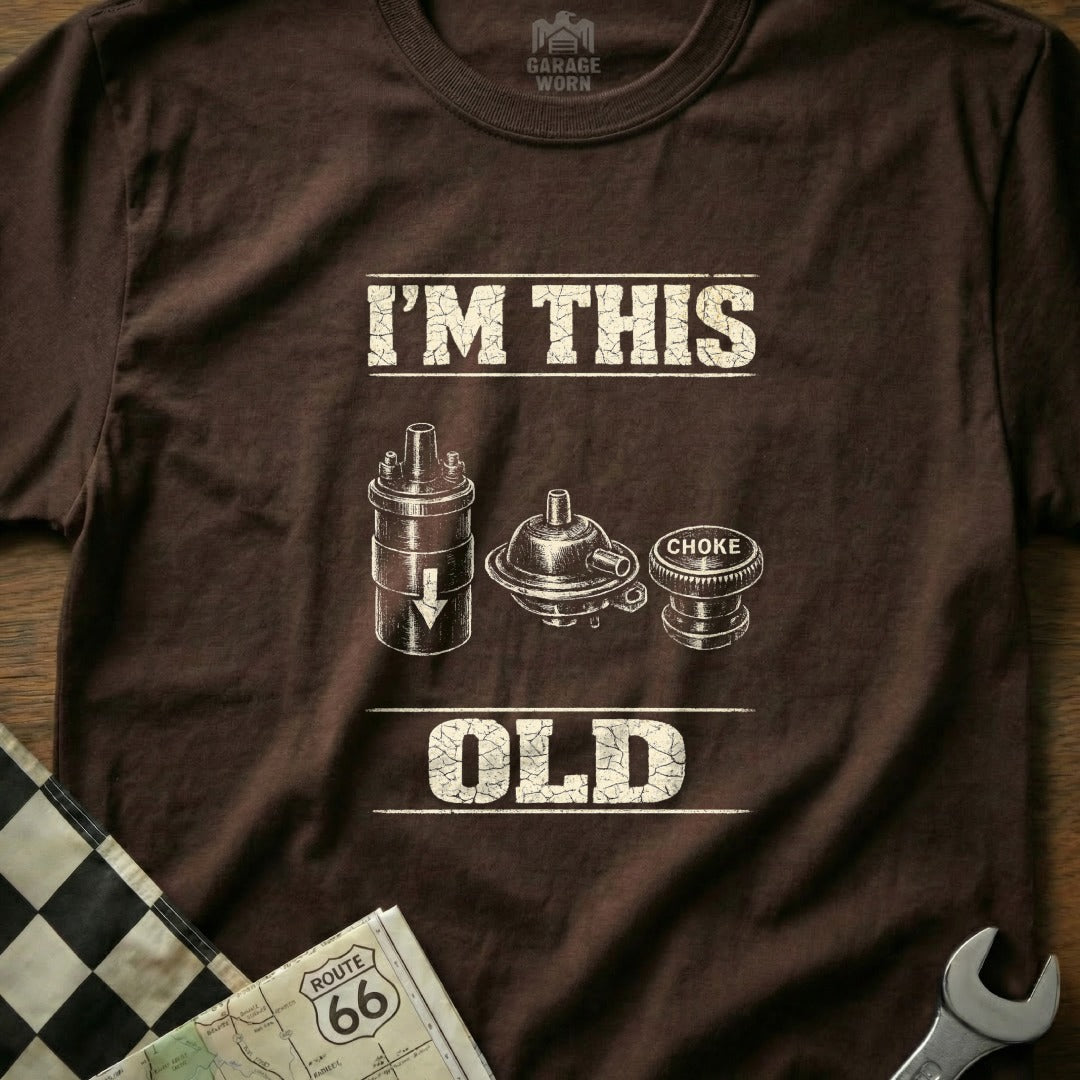 Brown t-shirt with "I'm This Old" text and vintage automotive parts.