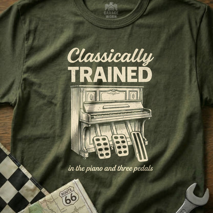 Olive green t-shirt with "Classically Trained" and an upright piano with three pedals.