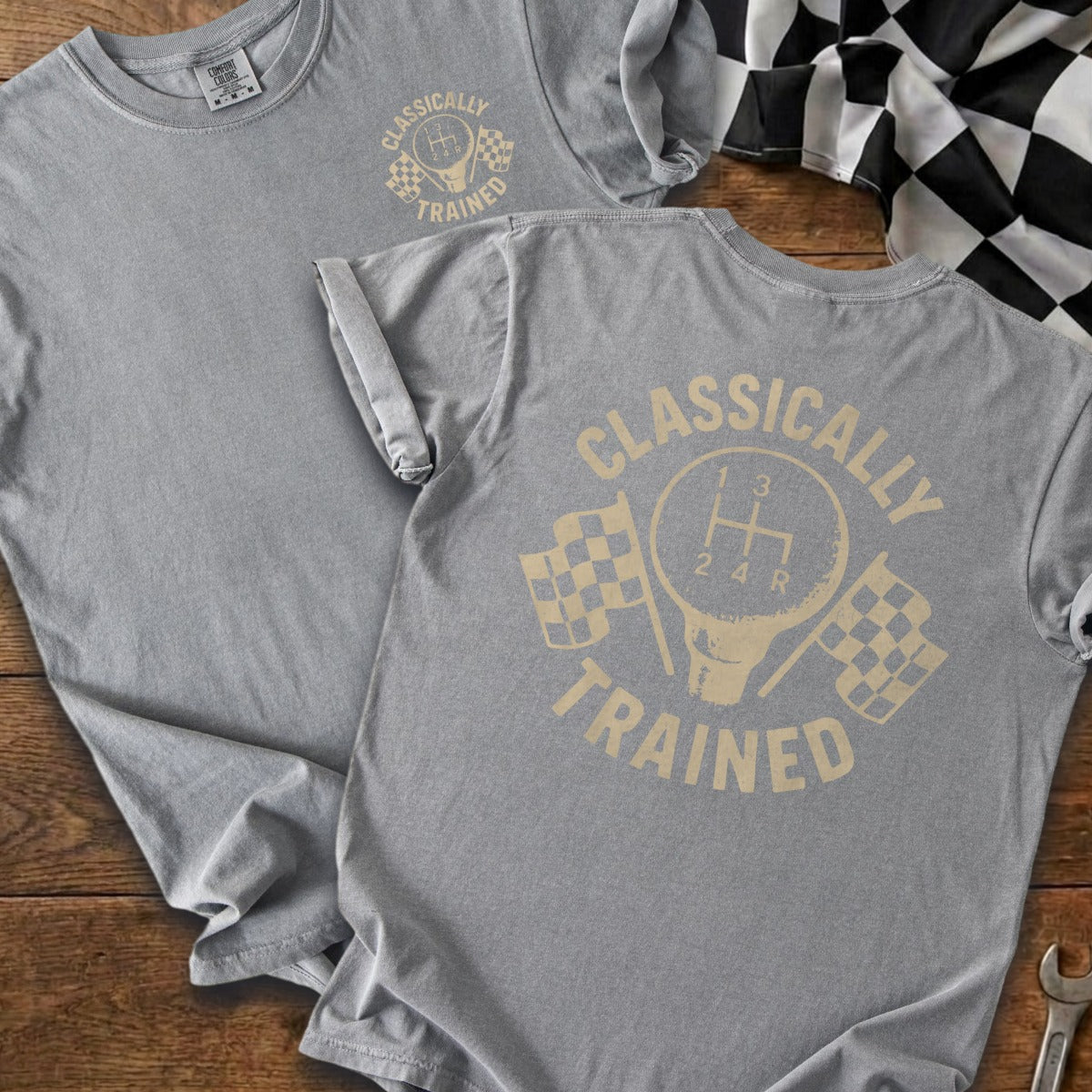 Grey t-shirt with manual shifter, checkered flags, and "Classically Trained" text.