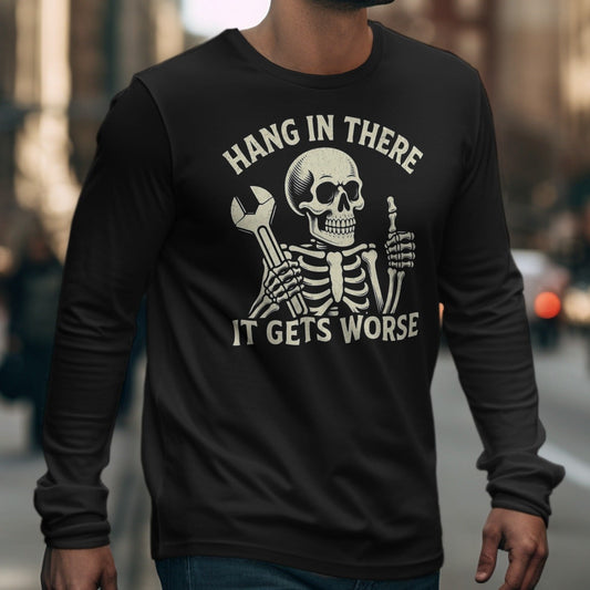 Black long sleeve shirt with skeleton graphic and text "HANG IN THERE IT GETS WORSE."