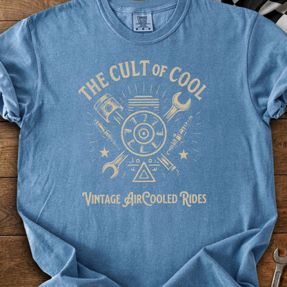 Blue t-shirt with "The Cult of Cool Vintage Air-Cooled Rides" graphic featuring engine parts.