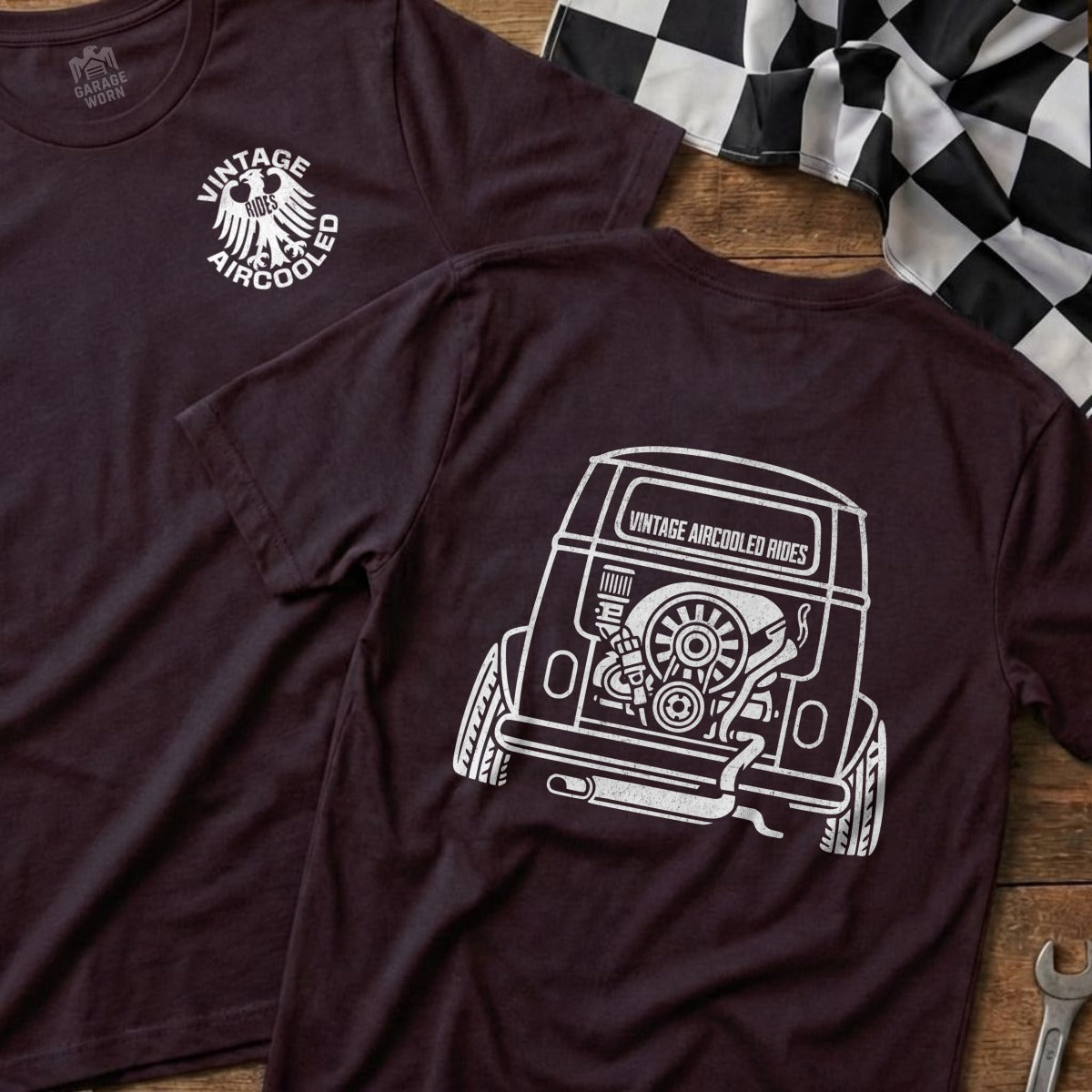 Burgundy t-shirt with vintage air-cooled Volkswagen bus graphic on back.