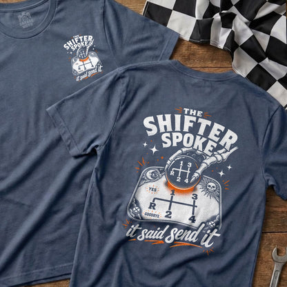 Dark blue t-shirt with "The Shifter Spoke, it said send it" and gear shift graphic.