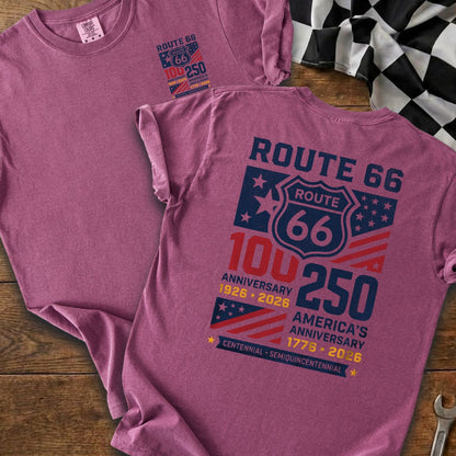 Two maroon t-shirts displaying Route 66 centennial and America's semiquincentennial anniversary designs.