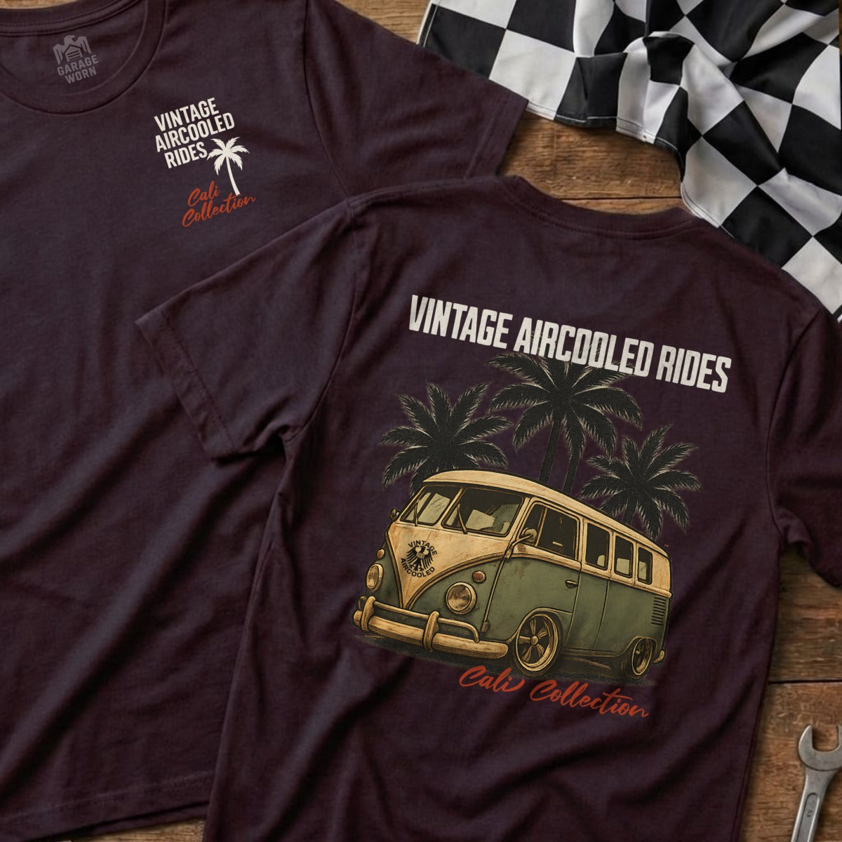 Dark t-shirt with vintage VW van and palm trees graphic.