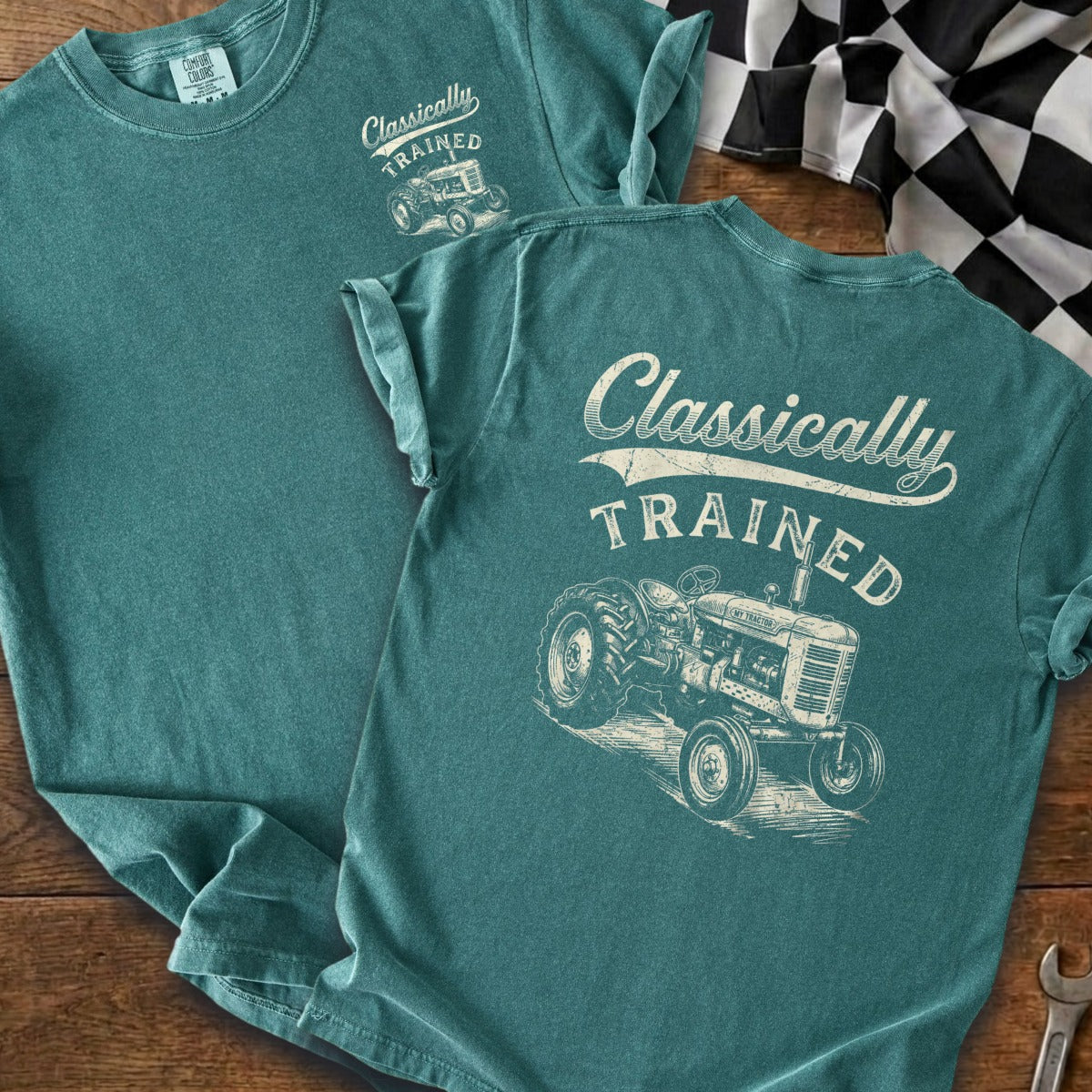 Teal t-shirt with "Classically Trained" text and vintage tractor graphic.