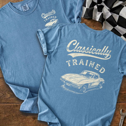 Blue t-shirt with distressed white text "Classically TRAINED" and a vintage car graphic.
