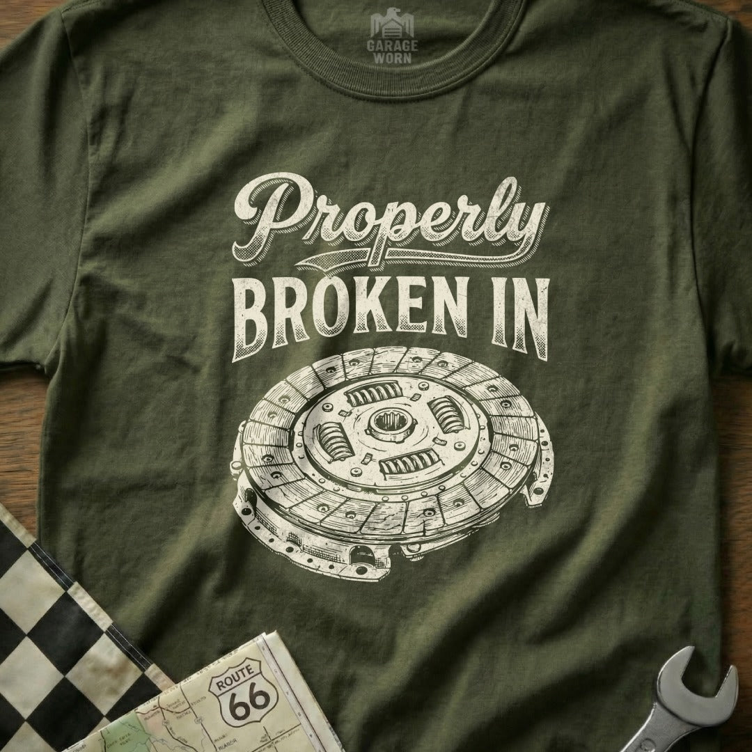 T-shirt with "Properly Broken In" text and clutch disc illustration.
