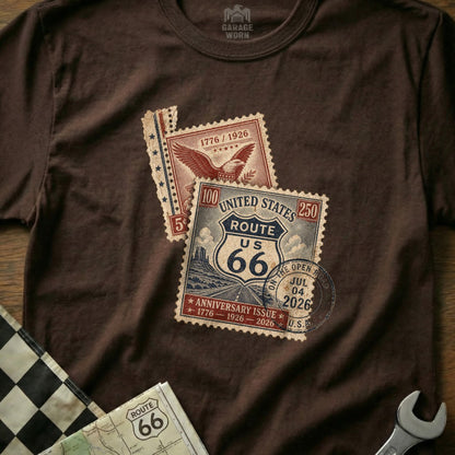 Brown t-shirt with Route 66 stamps featuring 1776-1926-2026 anniversary.